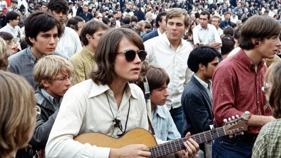 Woodstock hippie with guitar — Flux low-res candidate, plastic AI skin